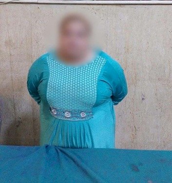 القبض علي ربة منزل تعتدي علي جيرانها بالقاهرة