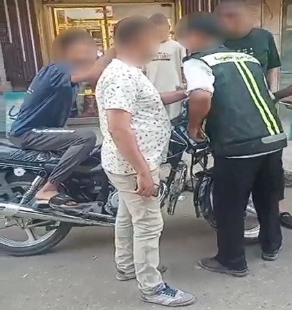 حقيقة فيديو إعتراض سائق دراجة على فرد شرطة  بالقليوبية