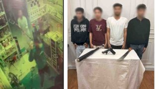 حقيقة فيديو قيام عامل وحلاق  يحملون الاسلحة بتحطيم محل بالمنوفية